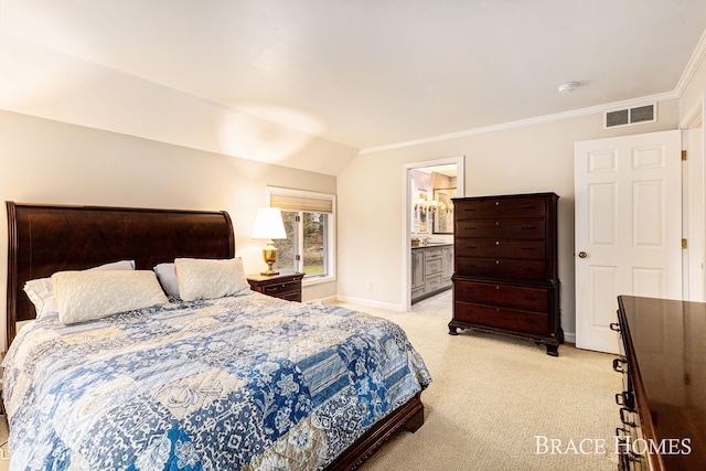 bedroom featuring baseboards, visible vents, connected bathroom, light colored carpet, and ornamental molding