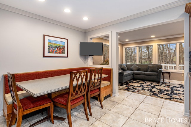 dining room featuring baseboards, ornamental molding, light tile patterned flooring, and recessed lighting