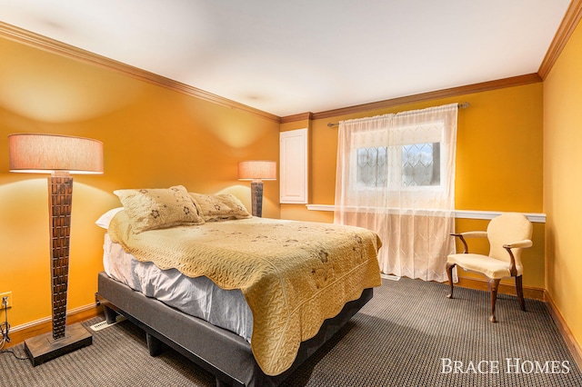 bedroom with dark colored carpet, ornamental molding, and baseboards