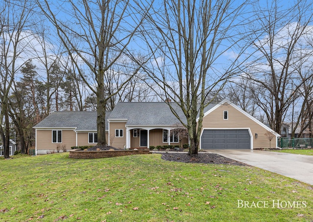 ranch-style home featuring driveway, a garage, a shingled roof, fence, and a front lawn