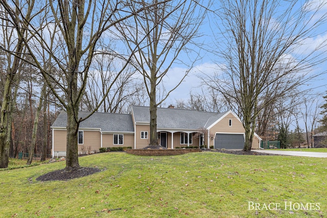 single story home with aphalt driveway, an attached garage, a chimney, and a front lawn