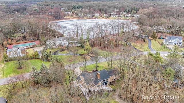 bird's eye view featuring a water view and a view of trees