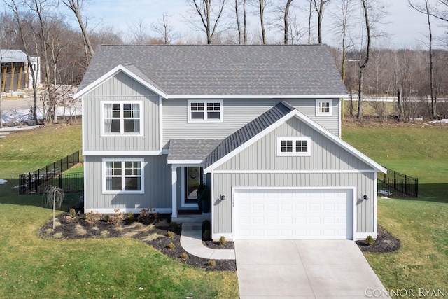 view of front of house featuring driveway, a shingled roof, fence, and a front lawn