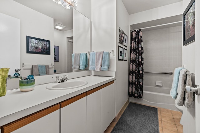 full bathroom featuring tile patterned flooring, shower / bathtub combination with curtain, and vanity