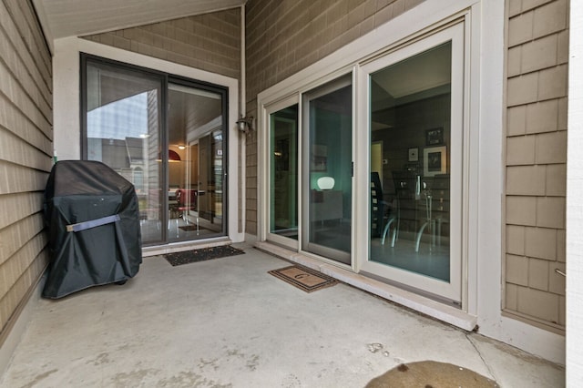 view of patio featuring a grill