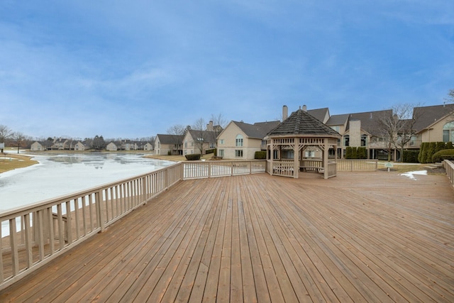 deck with a residential view and a gazebo