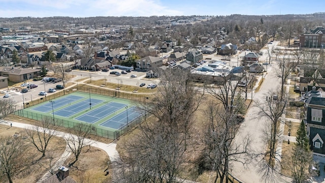 birds eye view of property with a residential view