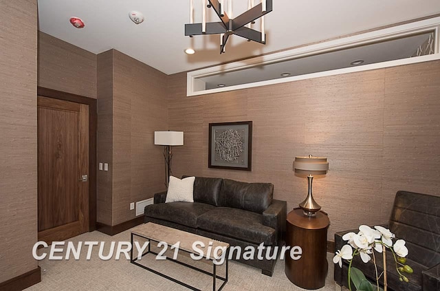 living area featuring carpet floors and visible vents