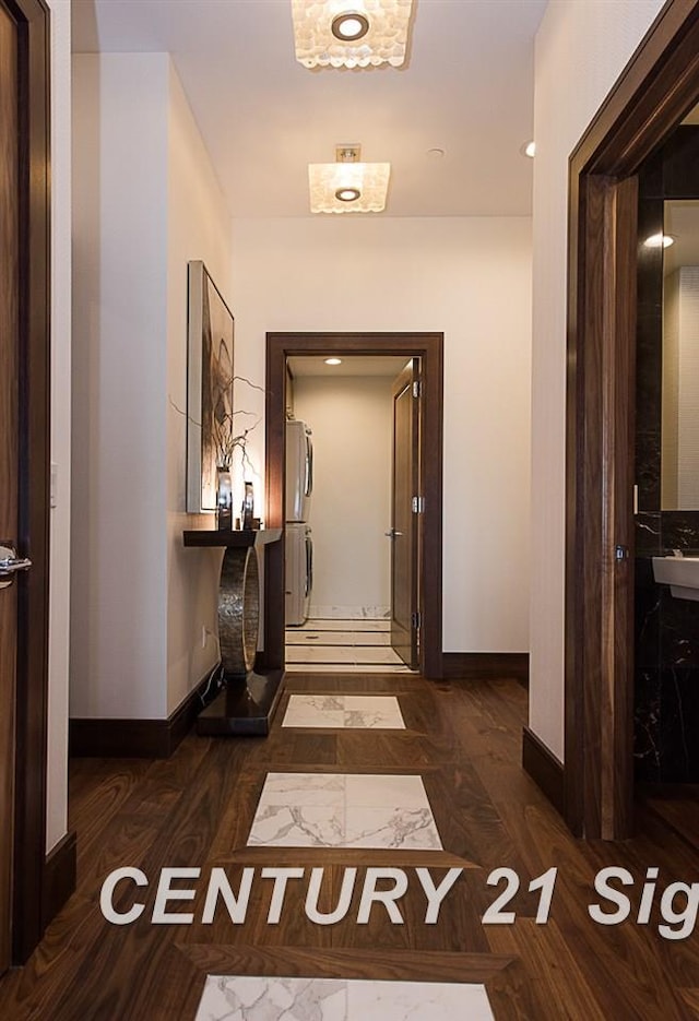 hallway featuring baseboards