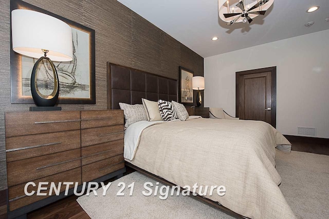 bedroom with recessed lighting and visible vents