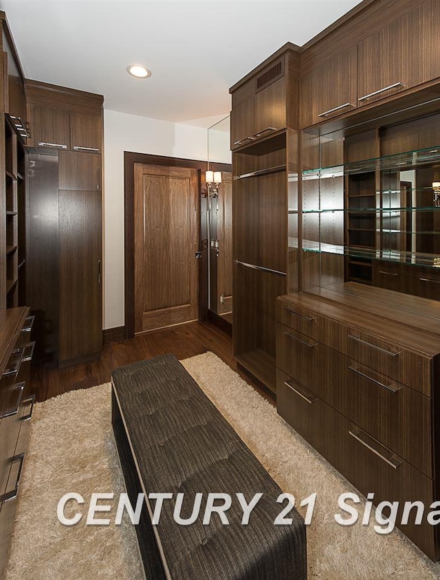 unfurnished bedroom featuring dark wood finished floors and recessed lighting