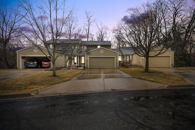 view of front of house with driveway and a garage