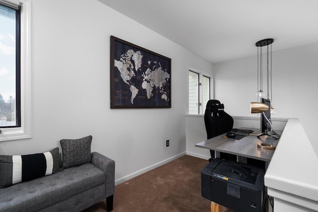 office area with baseboards and dark carpet