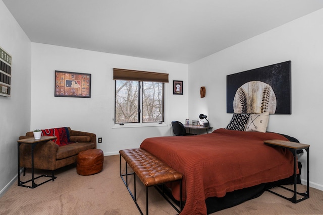 carpeted bedroom featuring baseboards