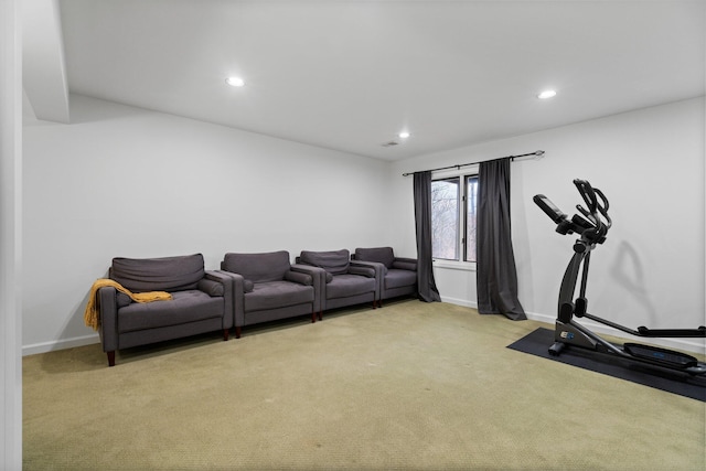 exercise room featuring recessed lighting, light colored carpet, and baseboards