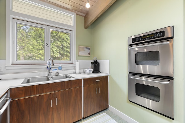 6863 Crystal Dr, Beulah, MI 49617 - kitchen featuring stainless steel appliances, light countertops, and wooden ceiling