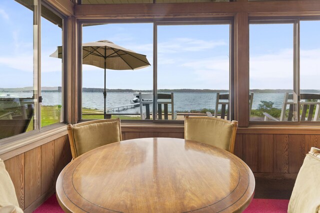 6863 Crystal Dr, Beulah, MI 49617 - sunroom with a water view