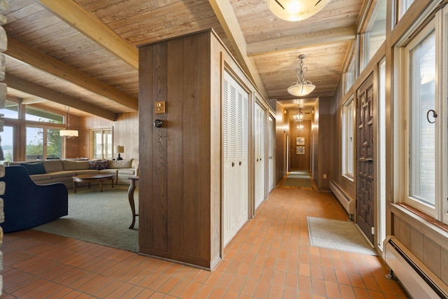 6863 Crystal Dr, Beulah, MI 49617 - hall featuring baseboard heating, a wood ceiling with exposed beams, wood walls, and tile patterned flooring