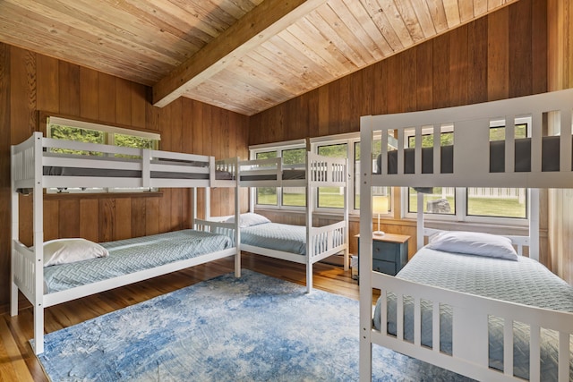 6863 Crystal Dr, Beulah, MI 49617 - bedroom with wood ceiling, wooden walls, and wood finished floors