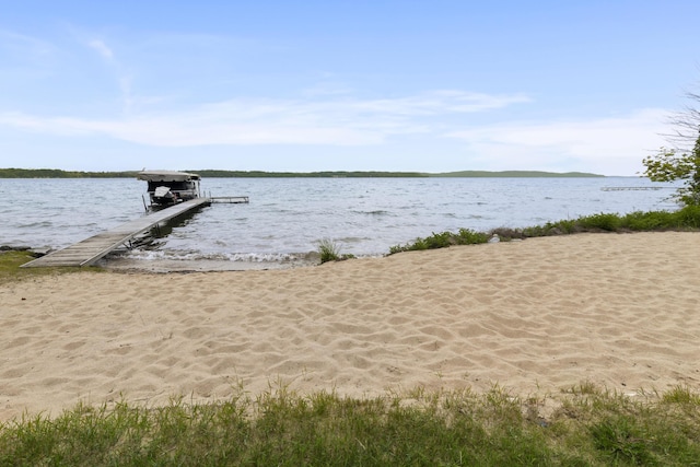 6863 Crystal Dr, Beulah, MI 49617 - dock with boat lift and a water view