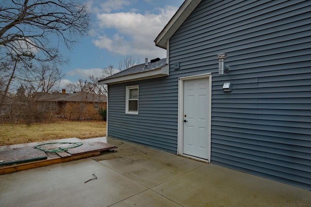 exterior space featuring a patio area and fence