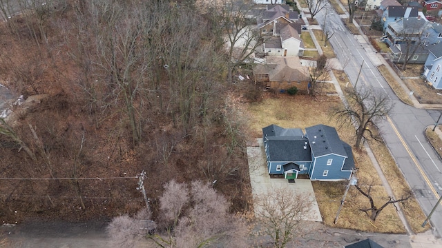 birds eye view of property with a residential view