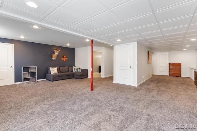 carpeted living room with baseboards and recessed lighting