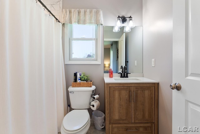 full bathroom featuring toilet and vanity