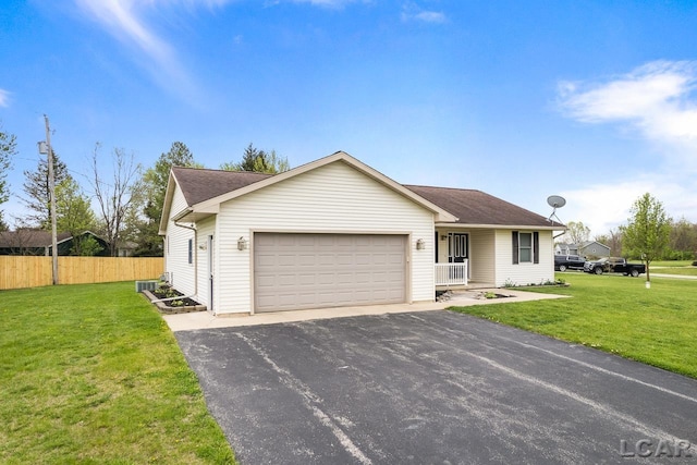 single story home featuring an attached garage, aphalt driveway, fence, and a front lawn