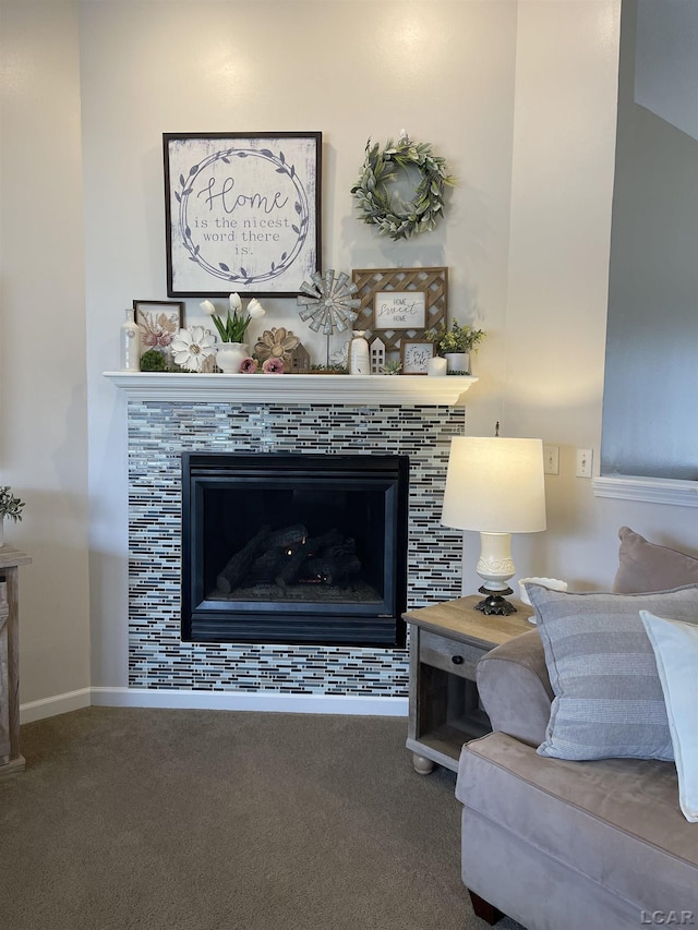 interior details featuring a fireplace, baseboards, and carpet flooring