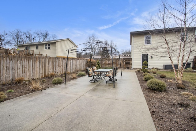 view of patio / terrace with a gazebo and a fenced backyard