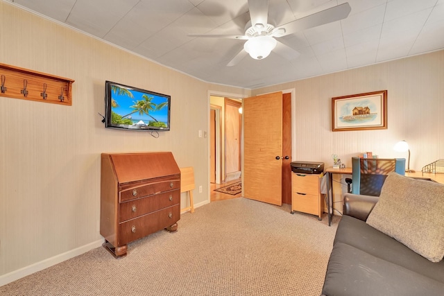 living room with light carpet, ceiling fan, and baseboards