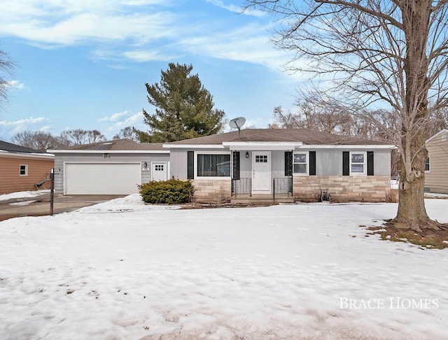 single story home featuring an attached garage and stone siding