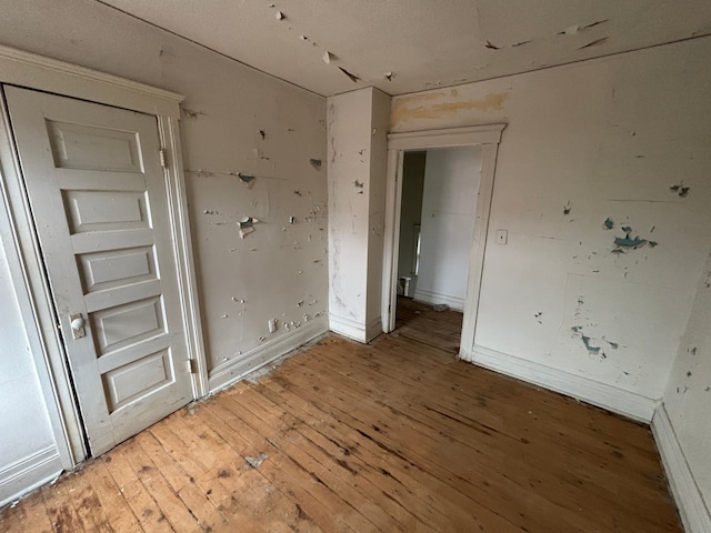 unfurnished room featuring light wood-style flooring