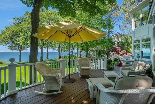 6059 Lakeshore Dr, West Olive, MI 49460 - deck with a water view and a lawn