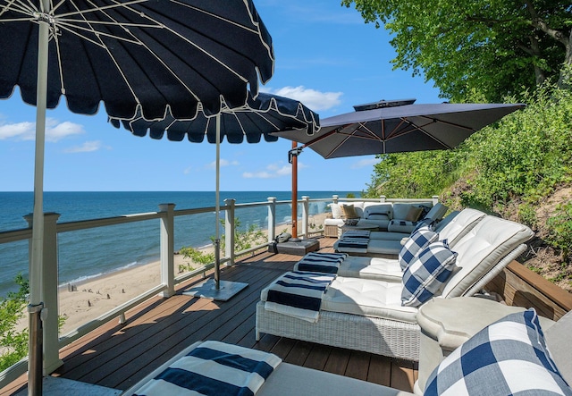 6059 Lakeshore Dr, West Olive, MI 49460 - wooden deck featuring a water view, an outdoor living space, and a view of the beach