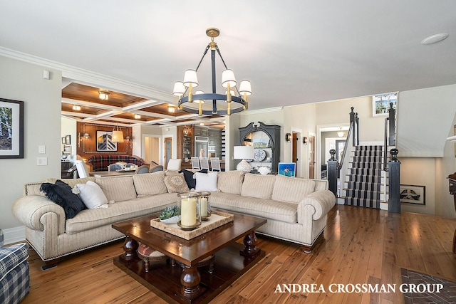 6059 Lakeshore Dr, West Olive, MI 49460 - living room featuring coffered ceiling, crown molding, an inviting chandelier, and hardwood / wood-style flooring