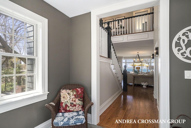 6059 Lakeshore Dr, West Olive, MI 49460 - interior space featuring dark wood-style floors, baseboards, and stairway