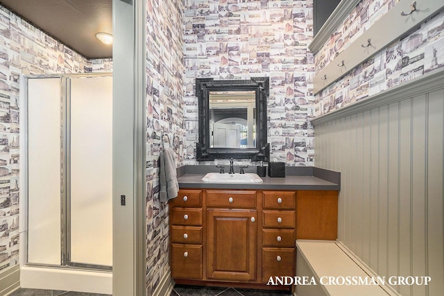 6059 Lakeshore Dr, West Olive, MI 49460 - bathroom featuring a shower stall and vanity