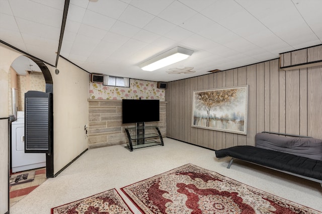 living area featuring carpet