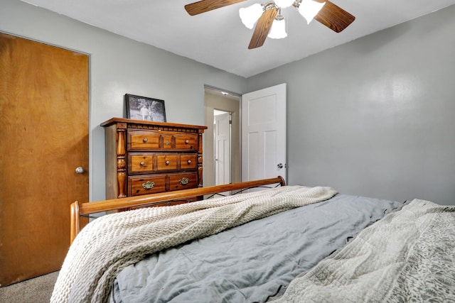 bedroom with carpet and a ceiling fan