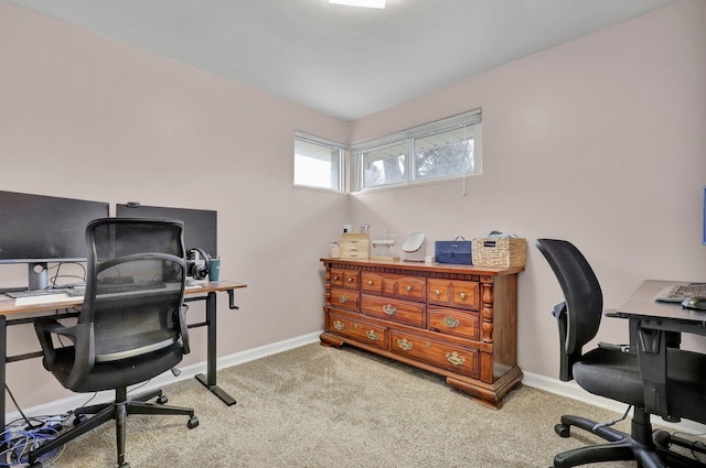 carpeted office with baseboards