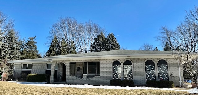 view of front facade with brick siding