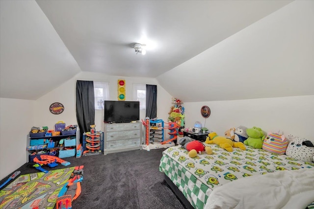 bedroom featuring carpet and vaulted ceiling