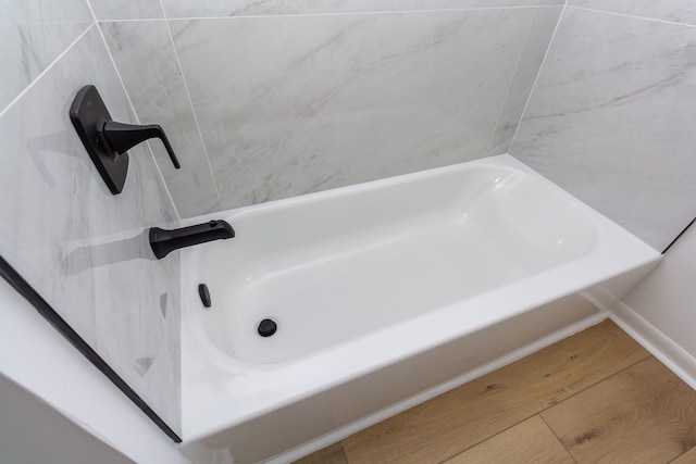 bathroom with wood finished floors