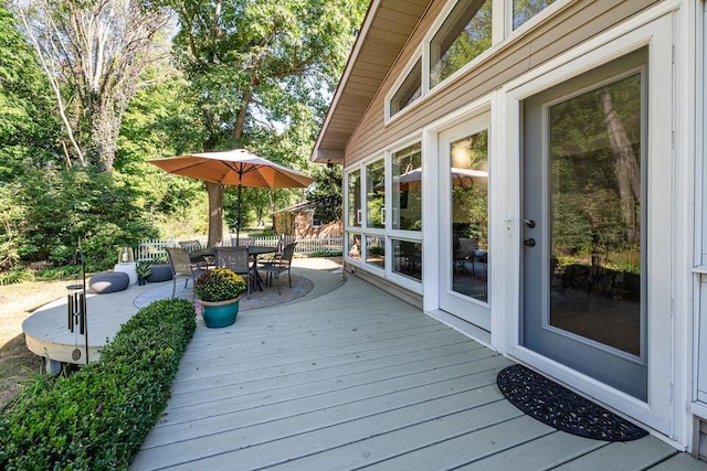 deck featuring outdoor dining area