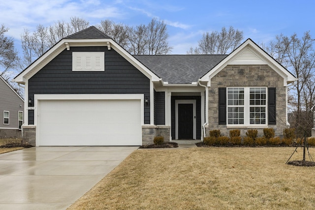 view of front facade with roof with shingles, concrete driveway, an attached garage, stone siding, and a front lawn