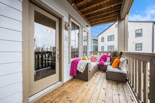 balcony featuring outdoor lounge area and a sunroom