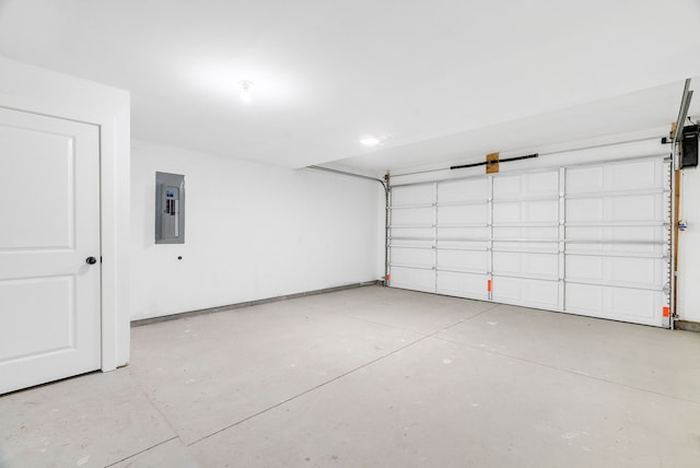 garage with electric panel and baseboards