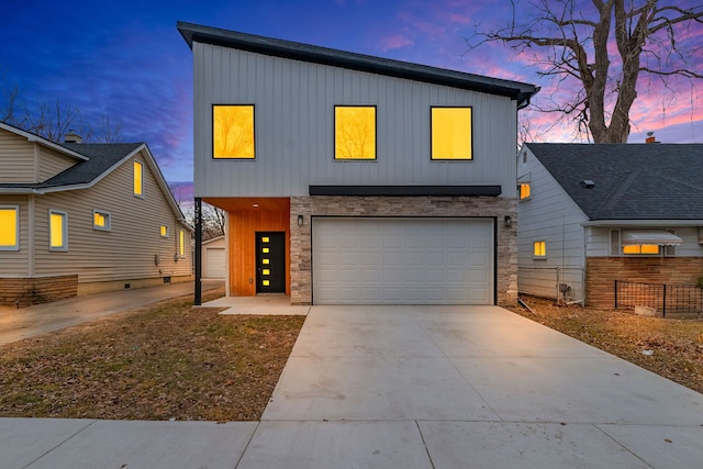 view of front of property with stone siding and fence